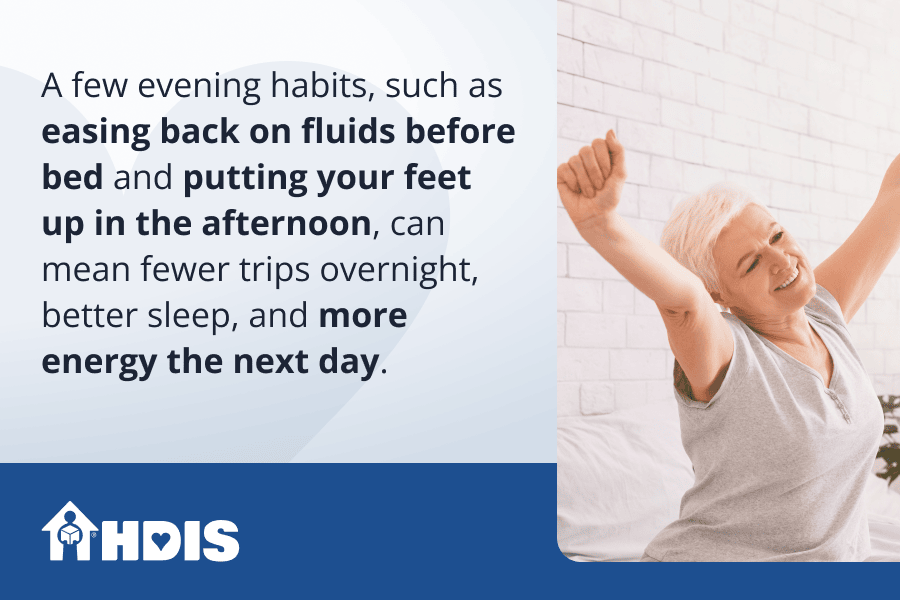 A happy middle-aged woman stretching after a good night's sleep