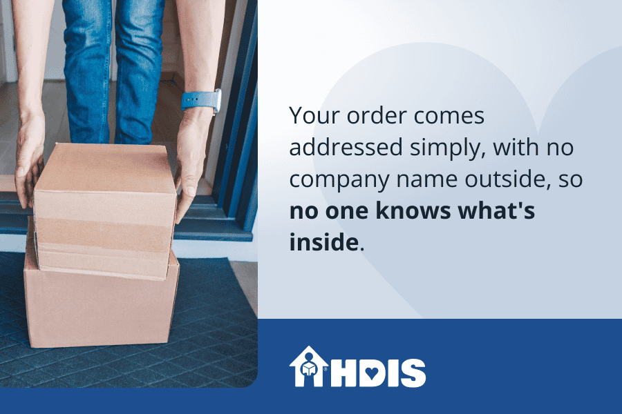Plain boxes delivered in front of a door