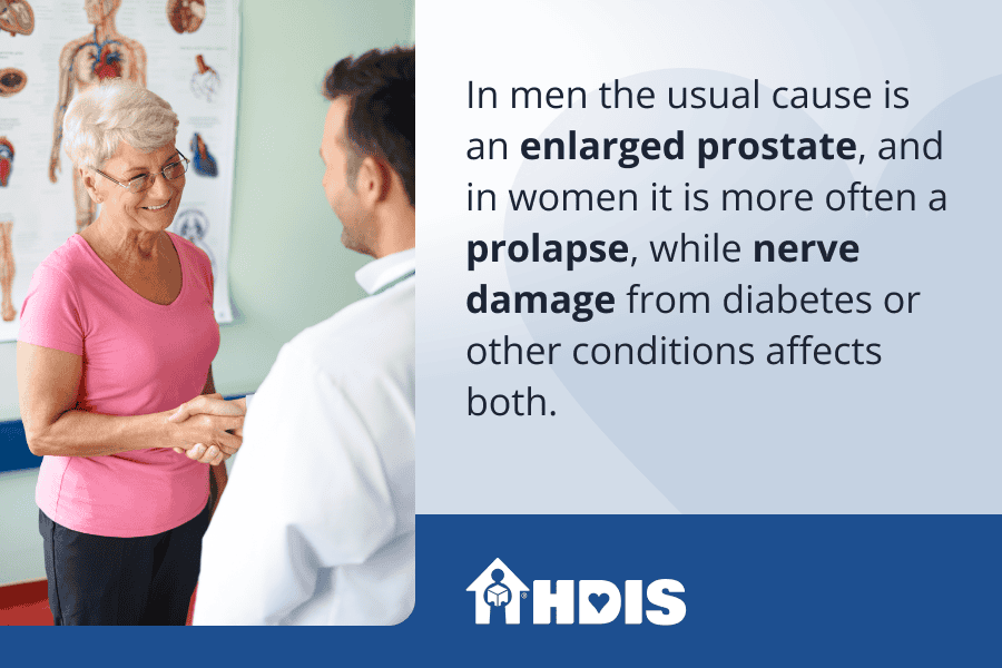 An elderly woman talking to a doctor